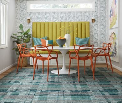 Dining room with FLOR Be Cool area rug in Teal