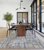 FLOR Savile Row dining room rug shown in Titanium