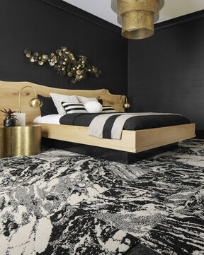 FLOR Zera bedroom area rug shown in Bone/Black