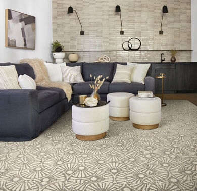 Seating area with FLOR Garden Party area rug shown in Dune