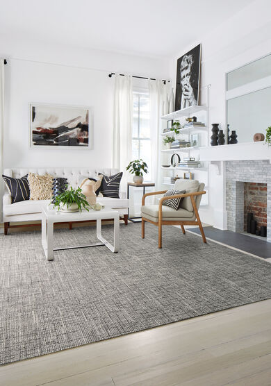 Living room with FLOR London Twill area rug shown in Flint/Pearl