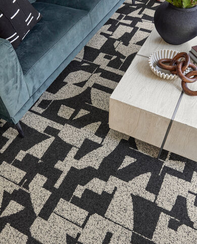 Living room with FLOR Modern Maze area rug shown in Flint