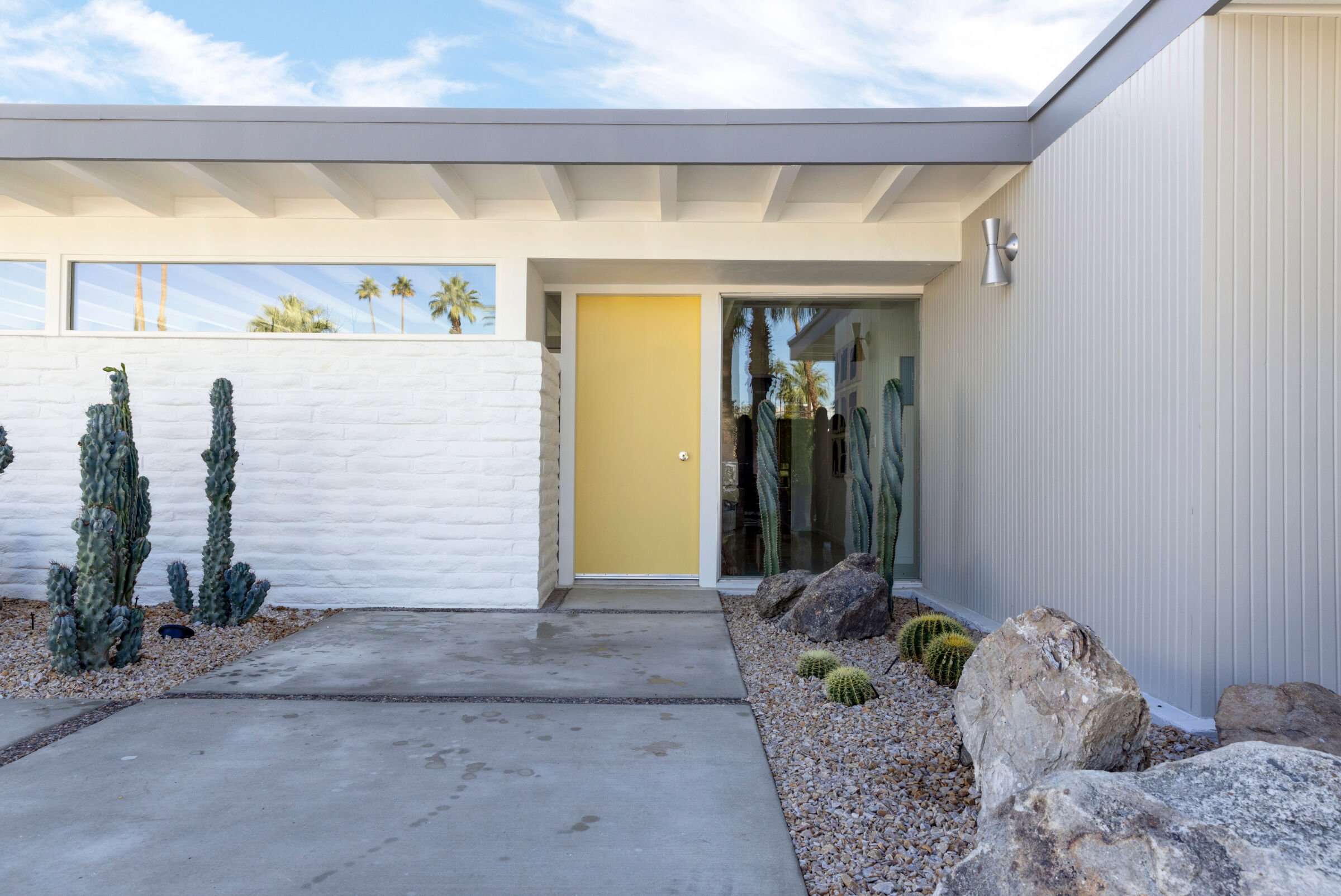 Exterior photo of yellow front door