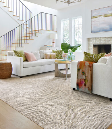 Airy living room with FLOR Open Invitation area rug shown in Tundra/Dune