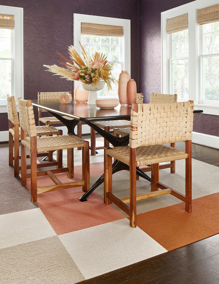 Dining room with area rug FLOR Made You Look shown in Pearl, Coral, Beige, Mink, and Tawny