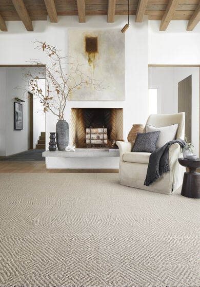 Sitting area with FLOR Pleats And Thanks area rug shown in Pigeon.