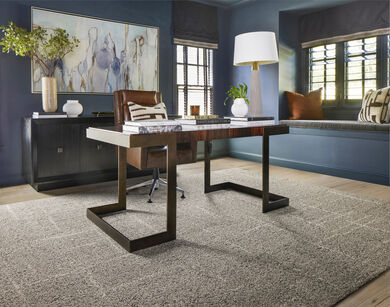 Office space with FLOR Old Fashioned area rug shown in Loam