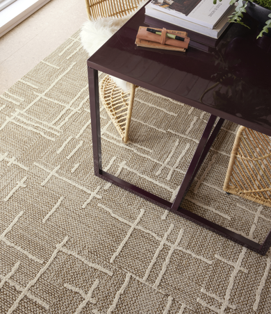 Dining room with FLOR Draper area rug shown in Topaz