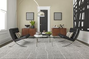 FLOR Old Fashioned living room rug shown in Stone