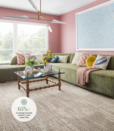 Chic seating area with FLOR Fully Barked area rug shwon in Tundra