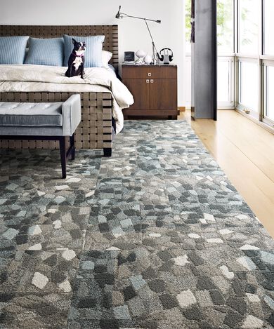 Dog on a bed in a bedroom showing Stone Course in Grey/Stone