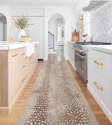 Kitchen aisle with FLOR Doe Re Mi shown in Pebble