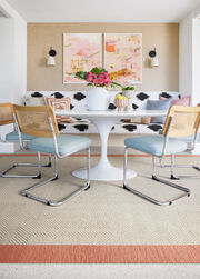 Dining nook with FLOR Suit Yourself Quarter Border shown in Linen/Coral