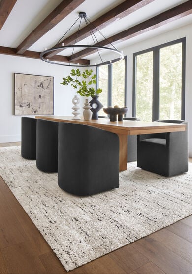 Dining room with FLOR Tivoli Touch area rug shown in Bone