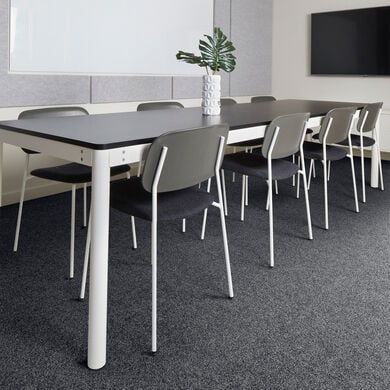 FLOR Industrious area rug in a conference room
