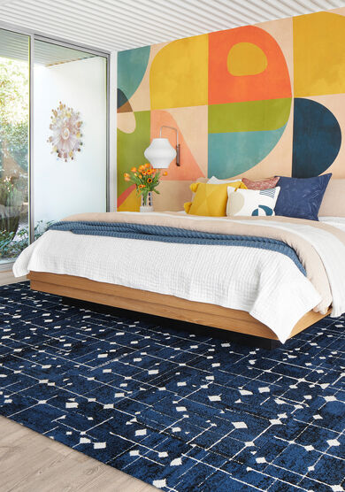 Bedroom with FLOR Hollin Hills area rug shown in Cobalt
