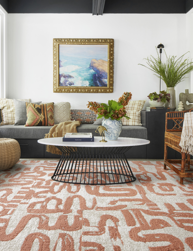 Living room with FLOR Scenic Route shown in Bone/Coral