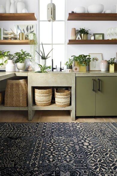 Kitchen area with FLOR Oasis Retreat area rug shown in Granite