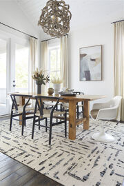 FLOR Lilting dining room rug shown in Grey