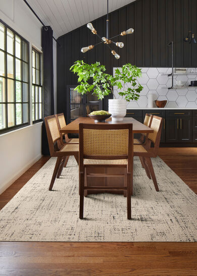 Dining room with FLOR Tuxedo Pocket area rug shown in Pearl