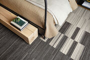 NEW FLOR Peninsula area rug shown in Black with Stratosphere and Hemisphere in PIgeon