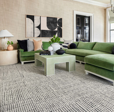 Living room with FLOR Penny For Your Thoughts area rug shown in Black