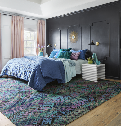 Bedroom with FLOR Over The Moon area rug shown in Teal