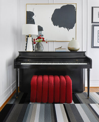 Piano with FLOR area rug Parallel Reality shown in Grey