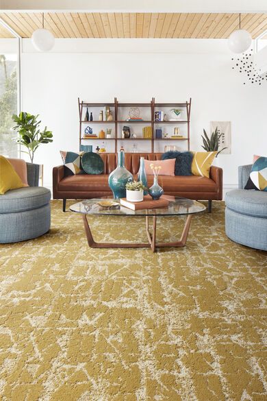 FLOR Seeing Stars living room rug shown in Dijon