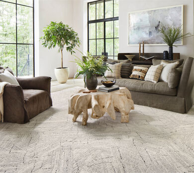 Living room with FLOR Trade Winds shown in Bone
