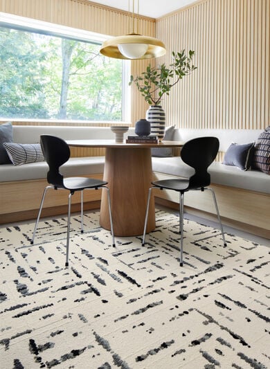 Dining room with FLOR Lilting area rug shown in Grey