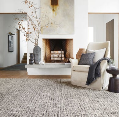 Living room with FLOR Tailored Touch area rug shown in Natural