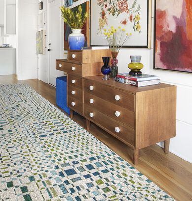 Gallery wall and sideboard with FLOR On The Square area rug in Teal