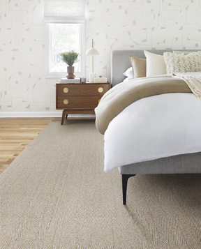 Mid-century modern bedroom shown with Tweed Indeed Rug shown in Dune