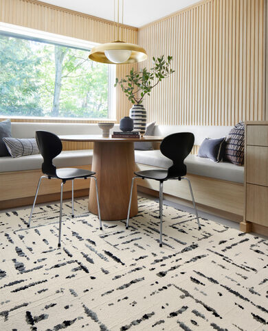 Dining room with FLOR Lilting area rug shown in Grey