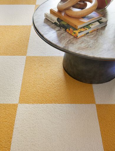 Detail of FLOR Heaven Sent area rug in Marigold and Bone