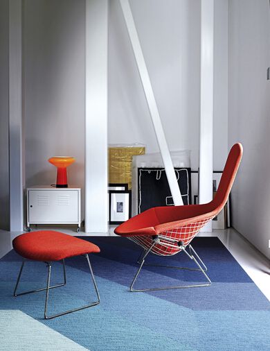 Chair with FLOR Made You Look area rug shown in Cobalt.