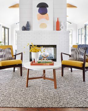 Living room with NEW FLOR area rug Knotting Hem in Pearl/Flint