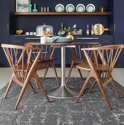 Dining room area with FLOR area rug Seeing Stars in Dusk.