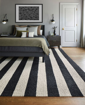 Bedroom with FLOR In The Deep area rug shown in Bone/Black