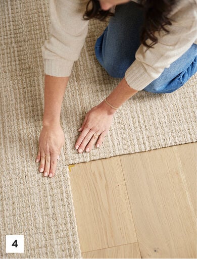 Step 4 - Pressing FLOR carpet tiles together firmly to finish installation