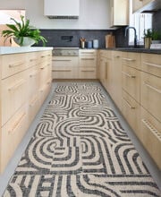 Kitchen Aisle with FLOR Around The Bend area rug shown in Pearl/Flint