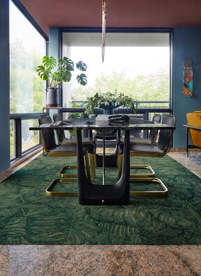 Dining room with FLOR Palm Reader area rug shown in Kale