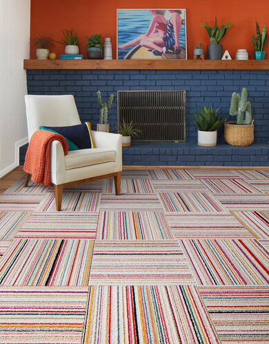 Fireplace area of seating area with FLOR Like Minded shown in Pink