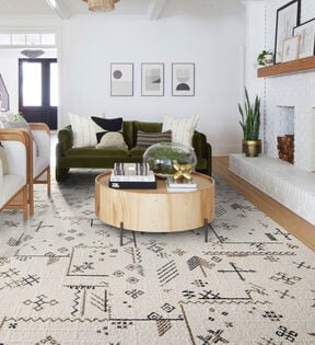 Living Room with FLOR Drawn To You area rug shown in Bone