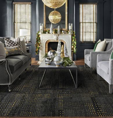 Sitting area with FLOR On The Dot area rug shown in Flint/Gold.