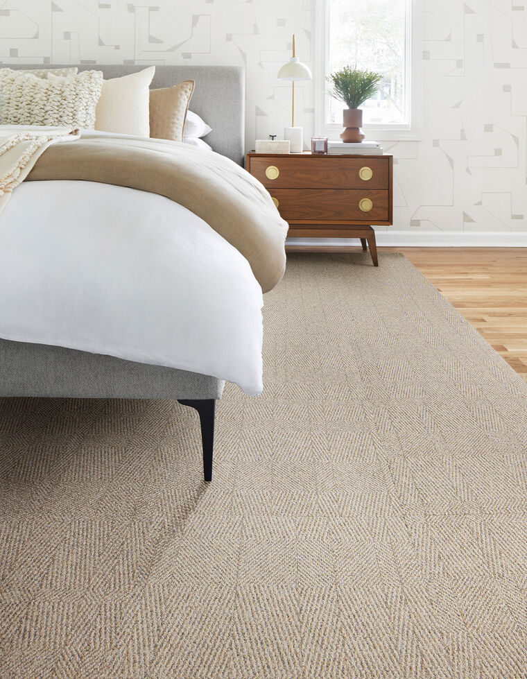 Bedroom with FLOR Tweed Indeed area rug shown in Dune