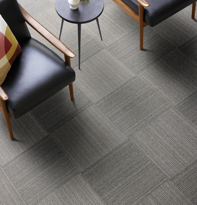 Chairs with FLOR Level Setting area rug shown in Grey