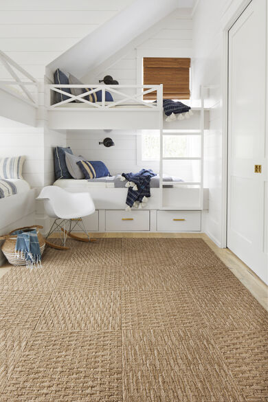 Bedroom with FLOR Coming Along area rug shown in Tan