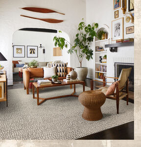 Living room with FLOR Connect The Dots area rug shown in Pearl/Dune